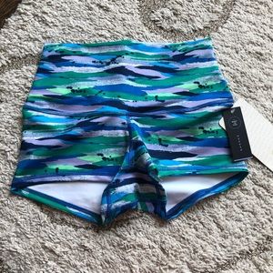 Lululemon Boogie roll down shorts.